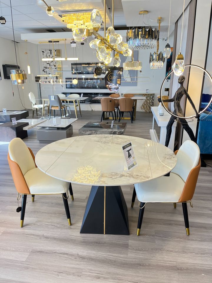 Modern extendable dining table with smooth wood finish and adjustable length, perfect for versatile dining spaces