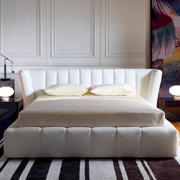 Front view of Ferrara bed featuring elegant design with upholstered headboard and sturdy frame