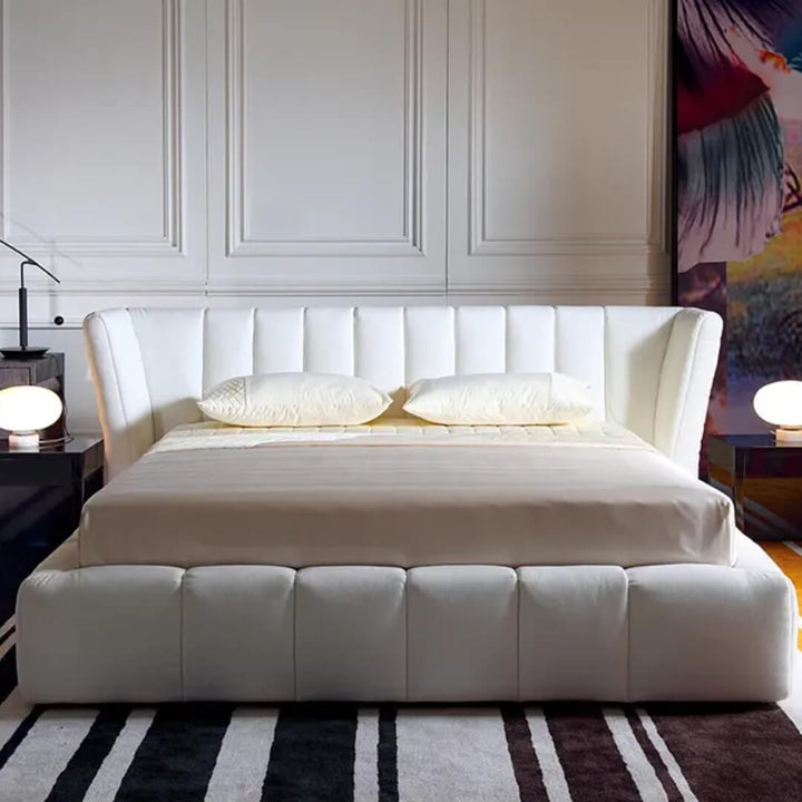 Front view of Ferrara bed featuring elegant design with upholstered headboard and sturdy frame