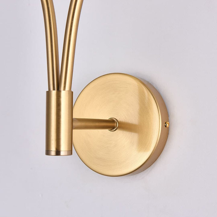 Fleuren teardrop wall light with gold mount, featuring a sleek modern design that adds a touch of luxury to elegant interiors