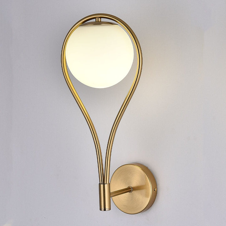 Fleuren teardrop wall light with elegant curved design and soft glow, enhancing the ambiance of sophisticated interior spaces