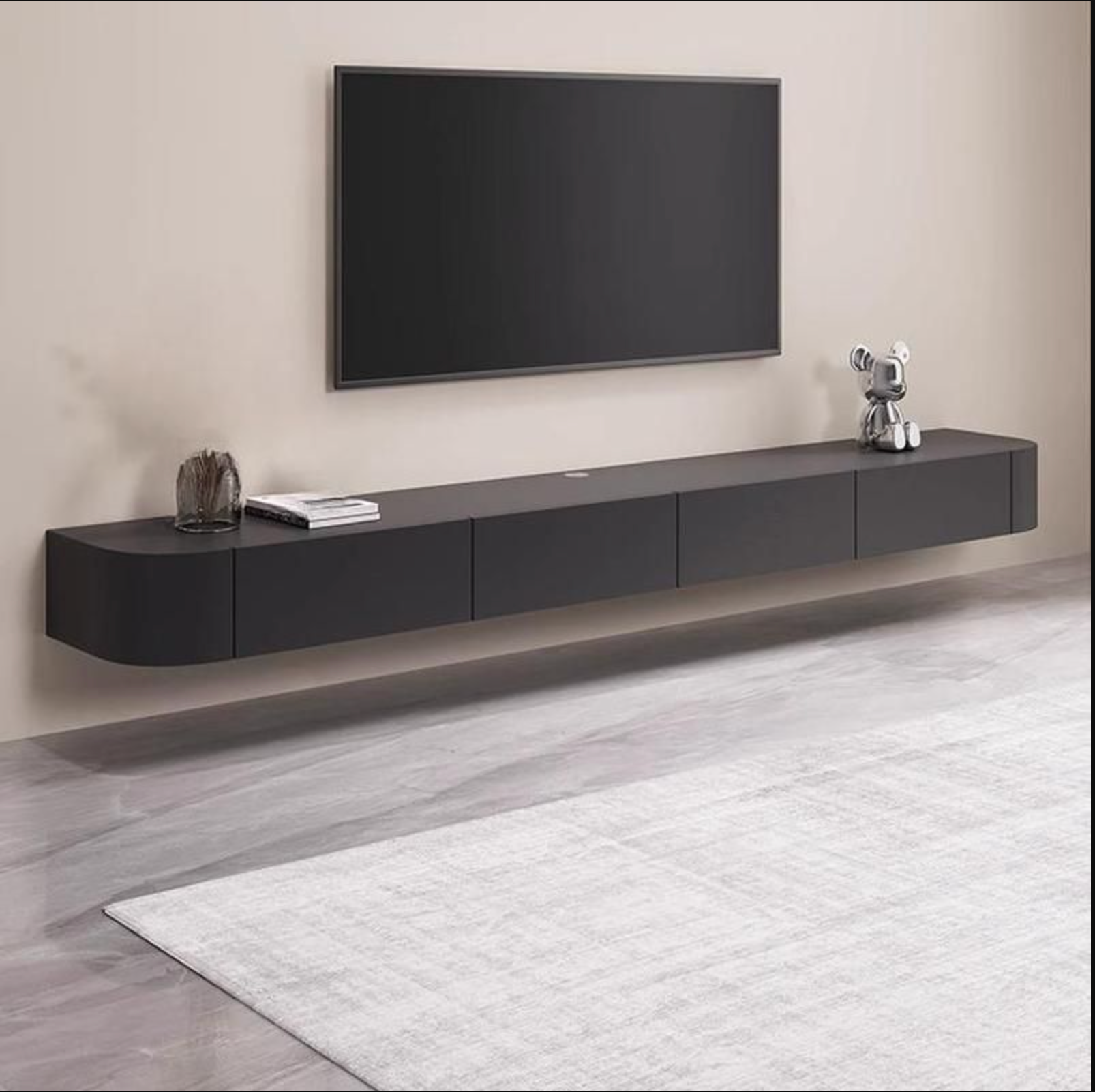 Custom floating black TV unit with sleek minimalist design and wall-mounted installation for modern living spaces