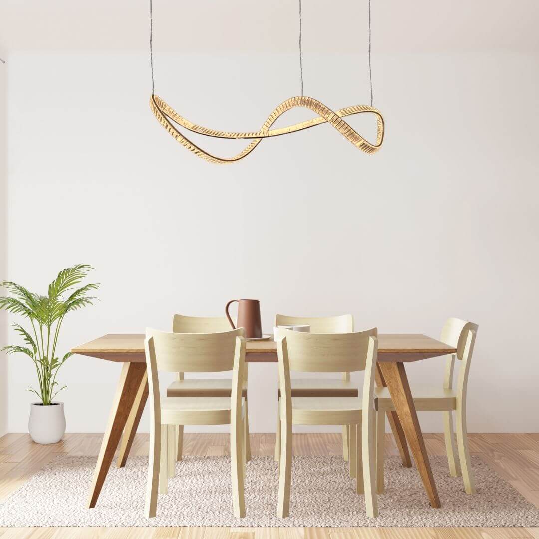 Galaxy twisted LED chandelier light hanging above dining table, adding modern elegance and ambient glow