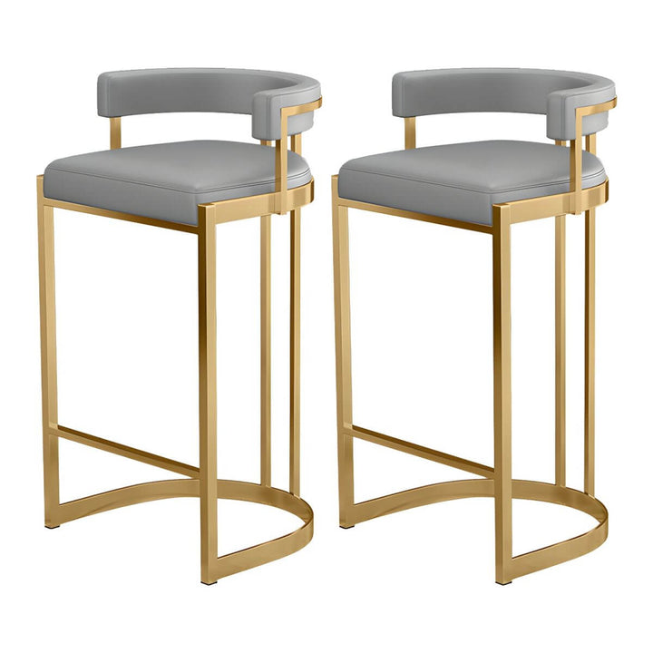 Close-up view of glam bucket upholstered bar stool with gold metal base – highlighting plush seat texture and luxurious metallic finish.