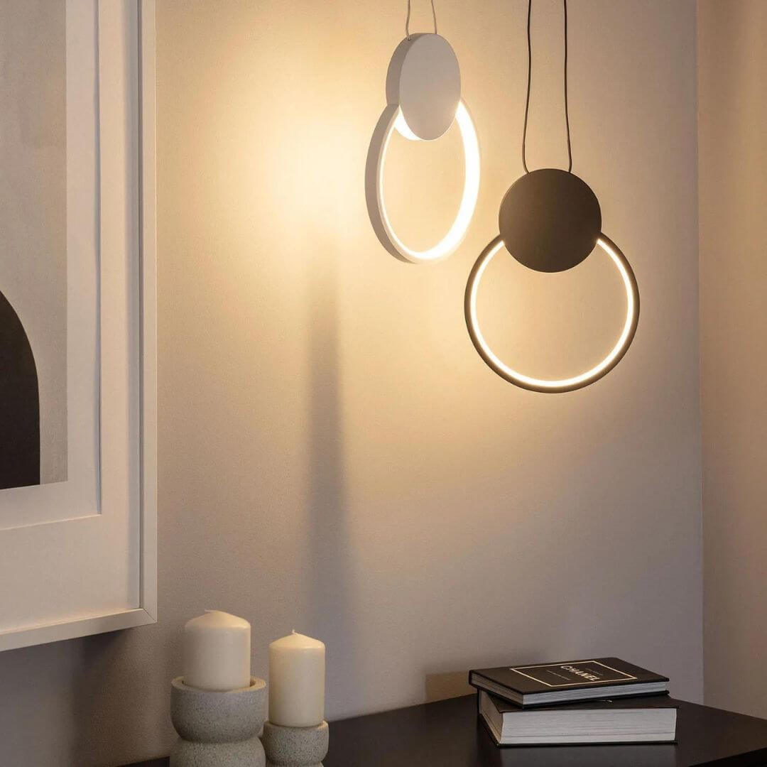 Gleam circular pendant light turned on in Australia, casting soft, ambient light with a modern and minimalist design