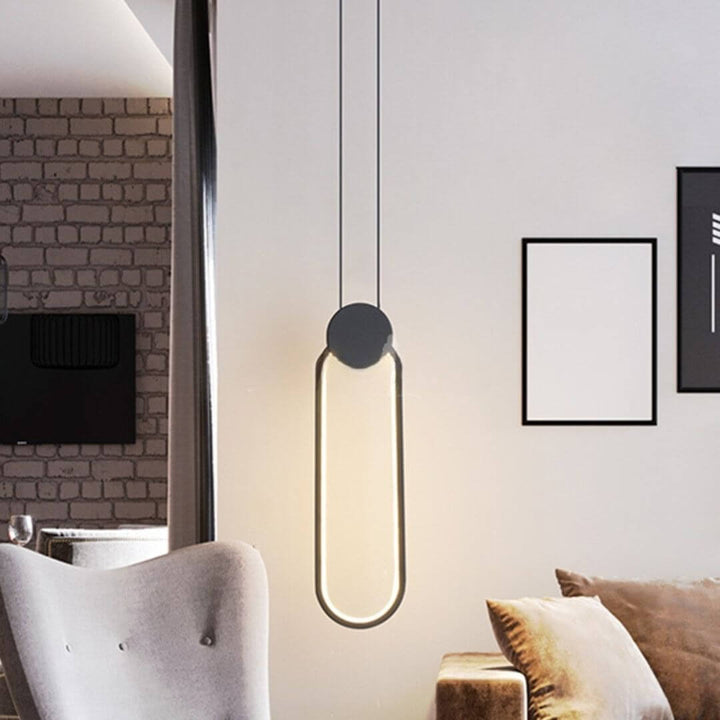 Glow Oval-Shaped Pendant Light Hanging Beside Sofa Set in Living Room – Modern Interior Light