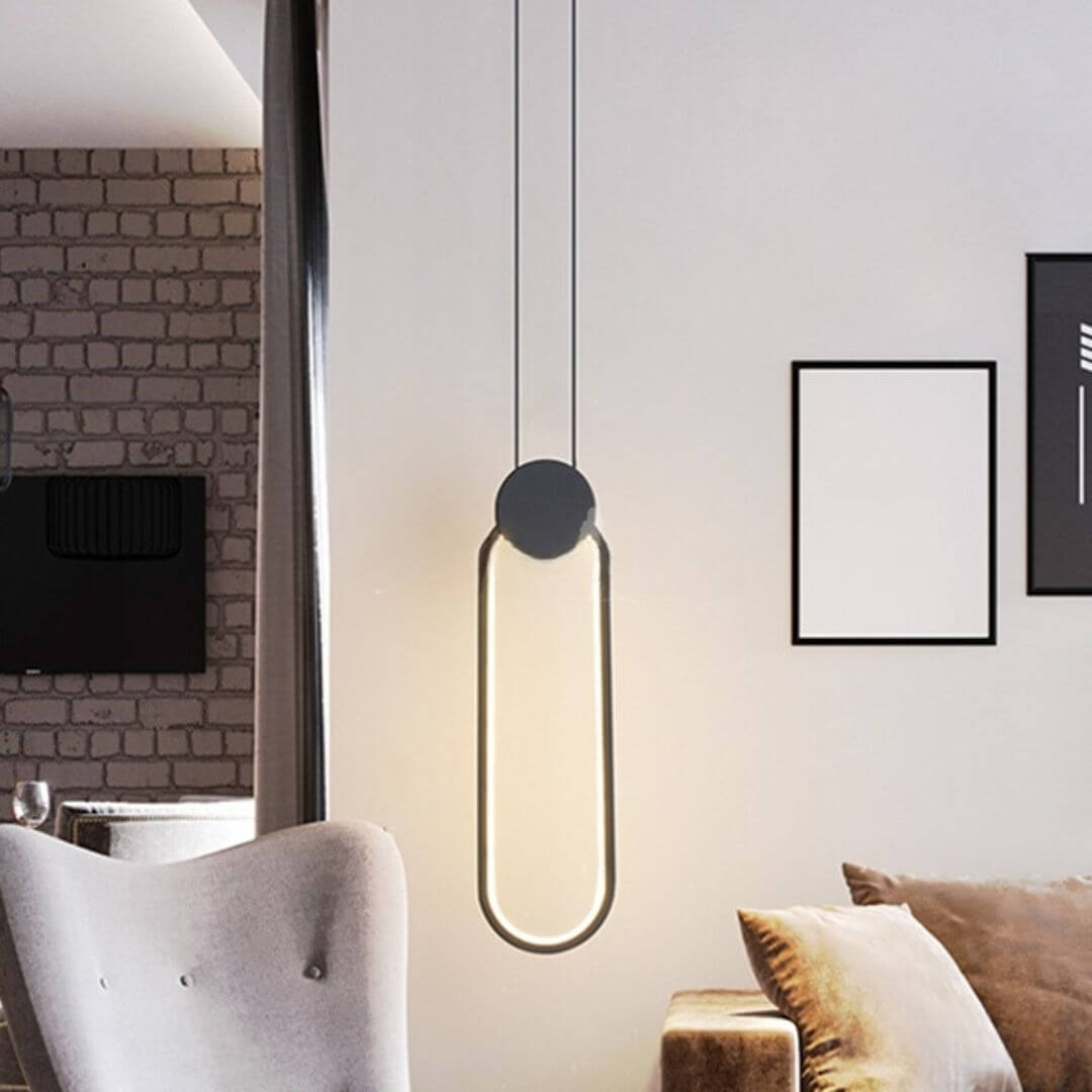 Glow Oval-Shaped Pendant Light Hanging Beside Sofa Set in Living Room – Modern Interior Light