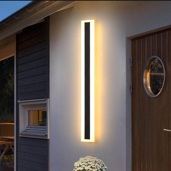 GlowEdge linear modern outdoor wall light – sleek weather-resistant fixture providing ambient illumination for exterior walls.