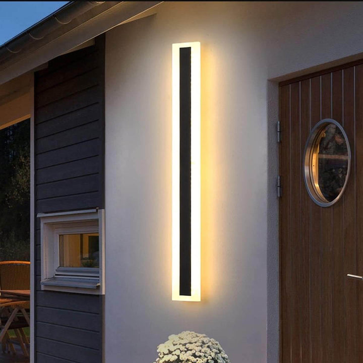 GlowEdge linear modern outdoor wall light – sleek weather-resistant fixture providing ambient illumination for exterior walls.
