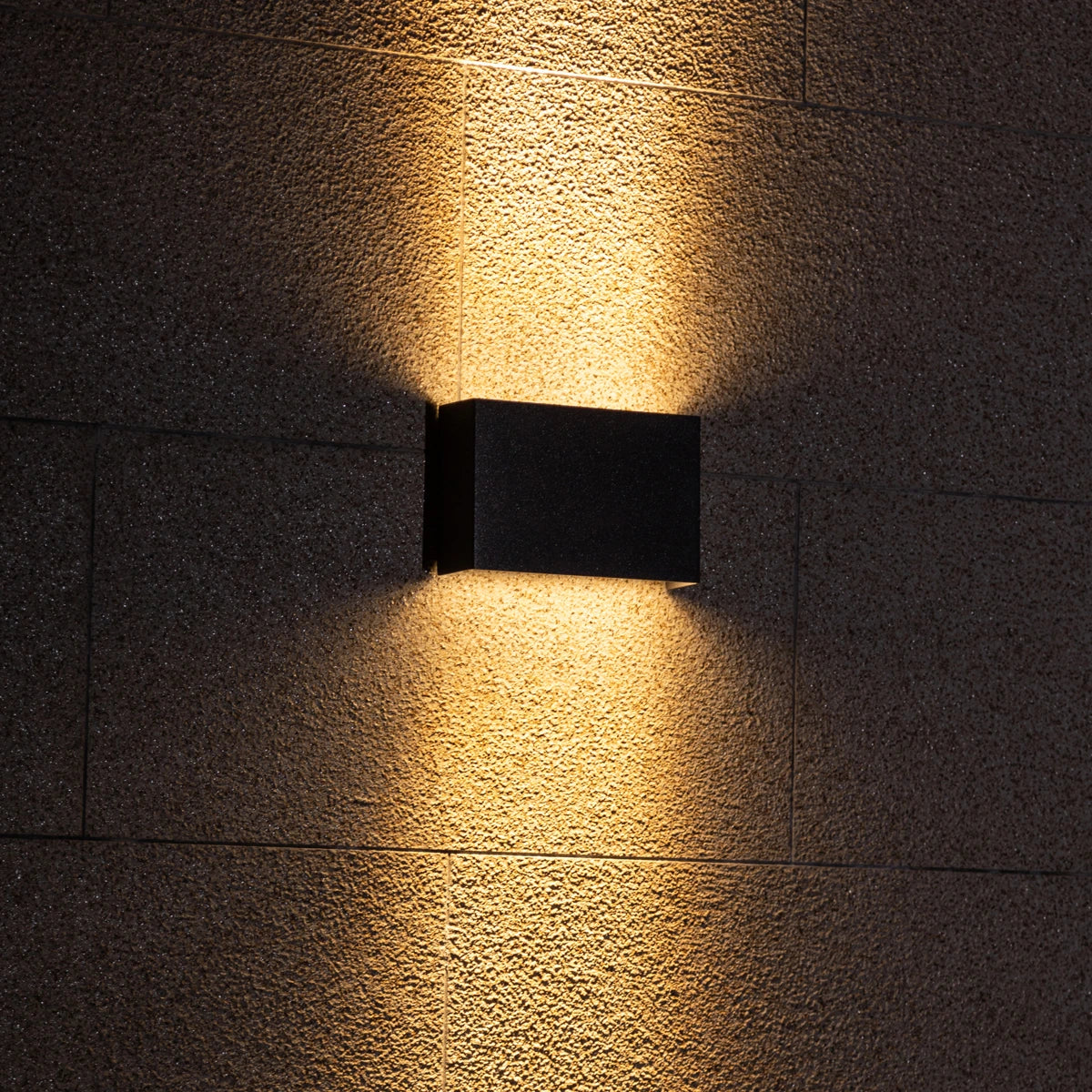 Graphite Glow LED Wall Light turned on – Bright and energy-efficient lighting for contemporary spaces.