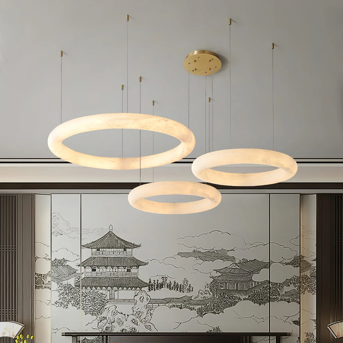 Halo di Pietra luxury chandelier with three-ring design in bedroom view for modern elegance