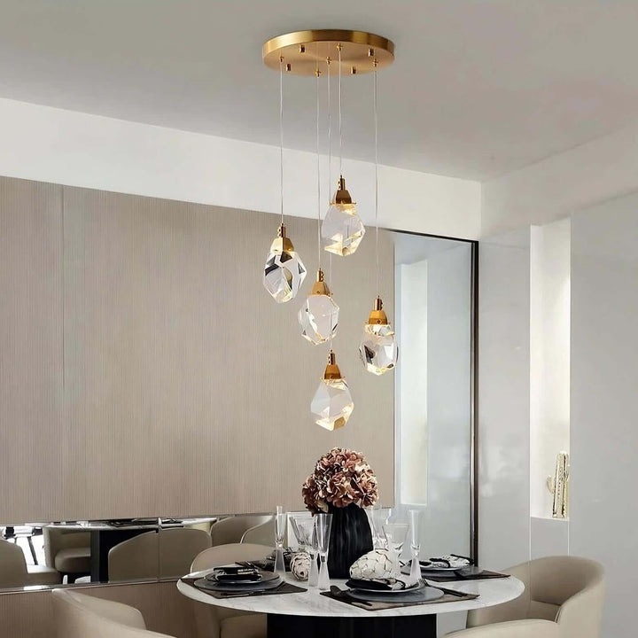 Harmony indoor crystal chandelier with 5 lamps hanging above dining table, creating elegant ambiance
