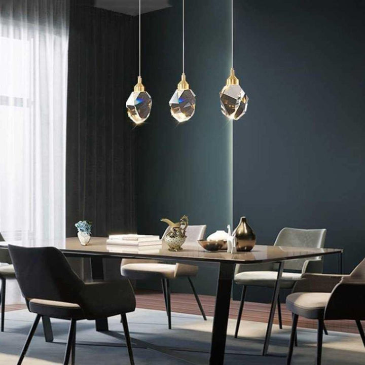 Harmony single-piece pendant light hanging above a dining table, offering warm and elegant lighting in a modern dining space