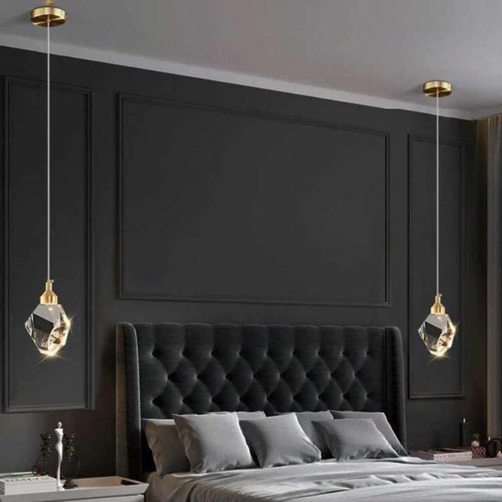 Harmony single-piece pendant light installed beside a bed, providing soft, warm lighting ideal for a cozy bedroom ambiance