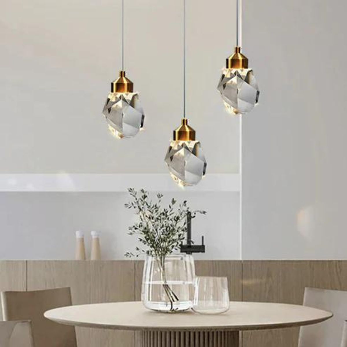 Harmony single-piece pendant light elegantly hanging above dining table, providing warm ambient lighting in a modern dining room