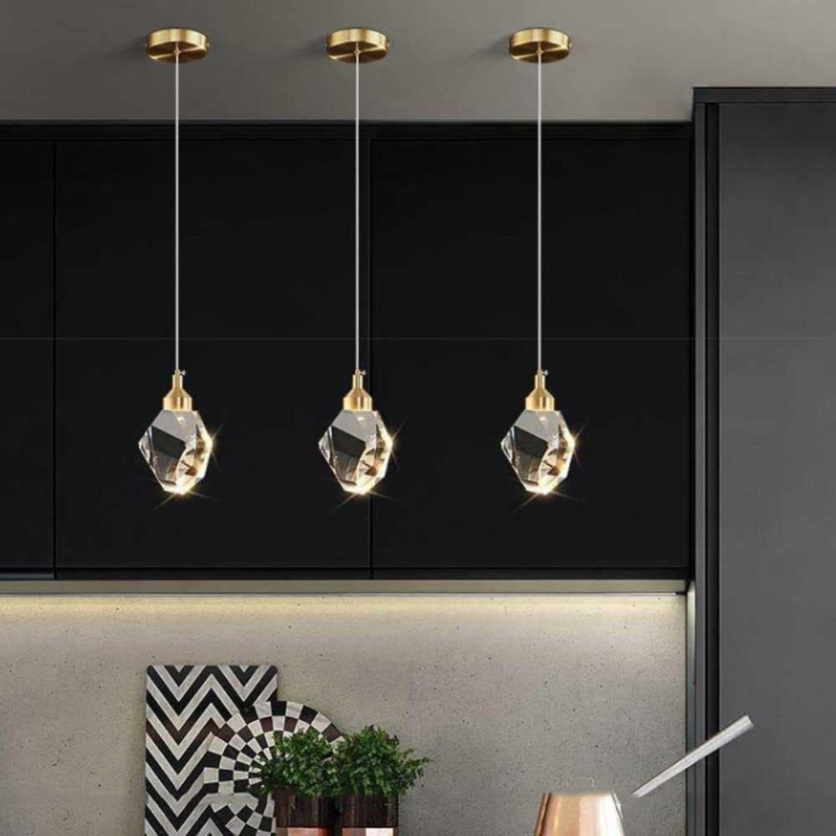 Harmony single-piece pendant light elegantly hanging above dining table, providing warm ambient lighting in a modern dining room