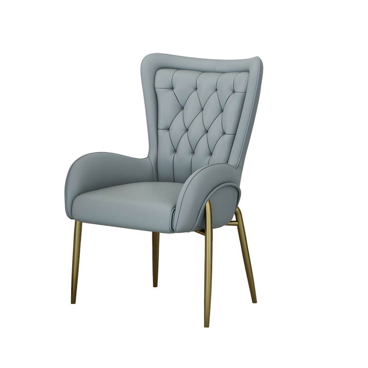 Henry dining chair with customizable leather or velvet upholstery and slim metal legs – close-up view highlighting luxurious material and modern design.