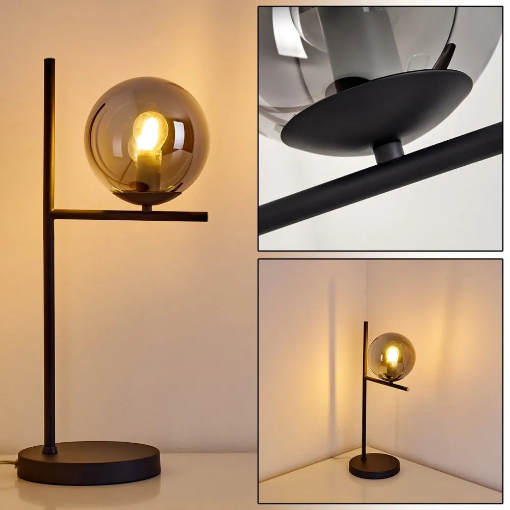 Hugo table light lamp in elegant interior, modern design with soft lighting for cozy ambiance.