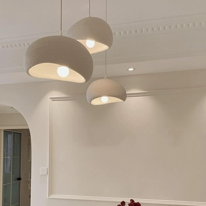 Three Igloo 40 resin pendant lights hanging together – modern dome design with smooth resin finish.