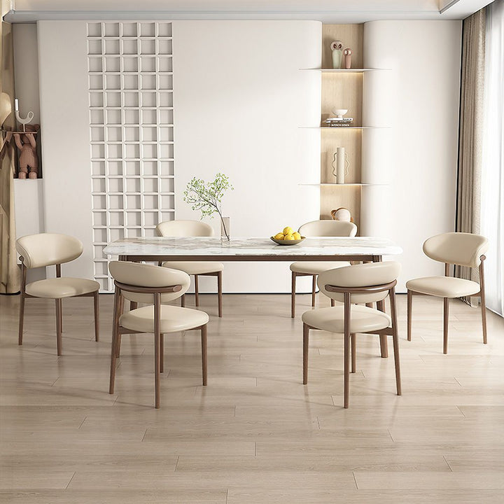White Japandi design chair paired with elegant dining table, featuring minimalist style in a modern interior setting