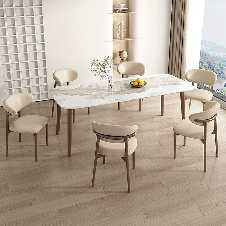 White Japandi design chair paired with elegant dining table, featuring minimalist style in a modern interior setting