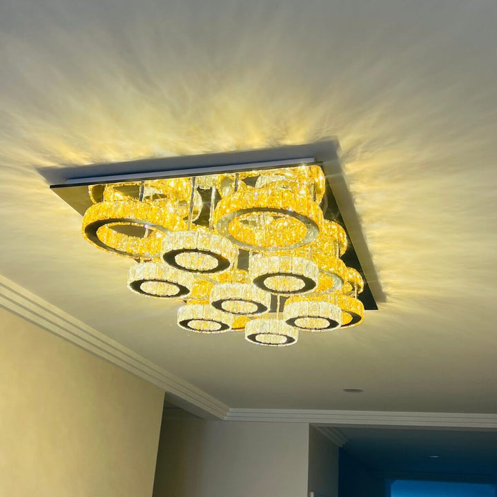 Side view of Jennifer large LED ceiling light installed in stylish modern living room
