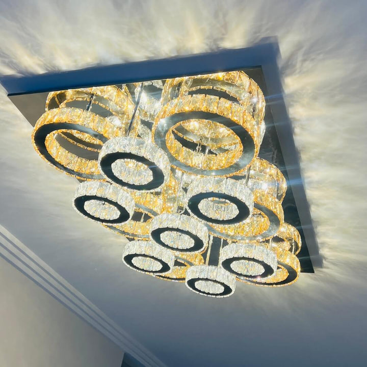 Bottom view of Jennifer large LED ceiling light turned on in modern living room interior