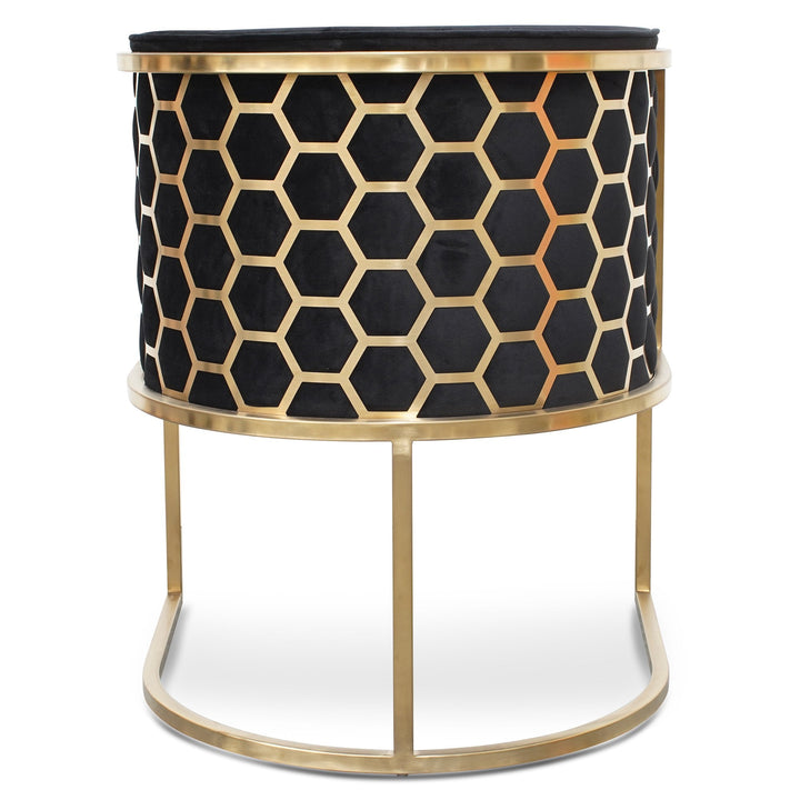 Back view of Kate lounge chair in black velvet with brushed gold armrests and blue steel sofa core – sleek and elegant design for modern interiors