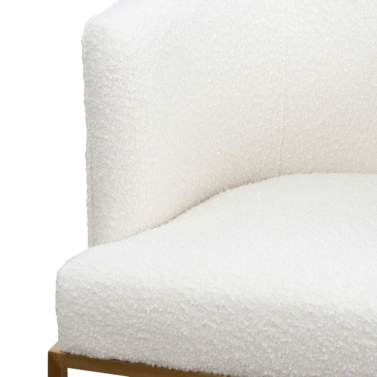 Detail view of Kate white velvet lounge chair with black velvet seat, brushed gold armrests, and blue steel sofa core – highlighting premium fabric texture and refined craftsmanship