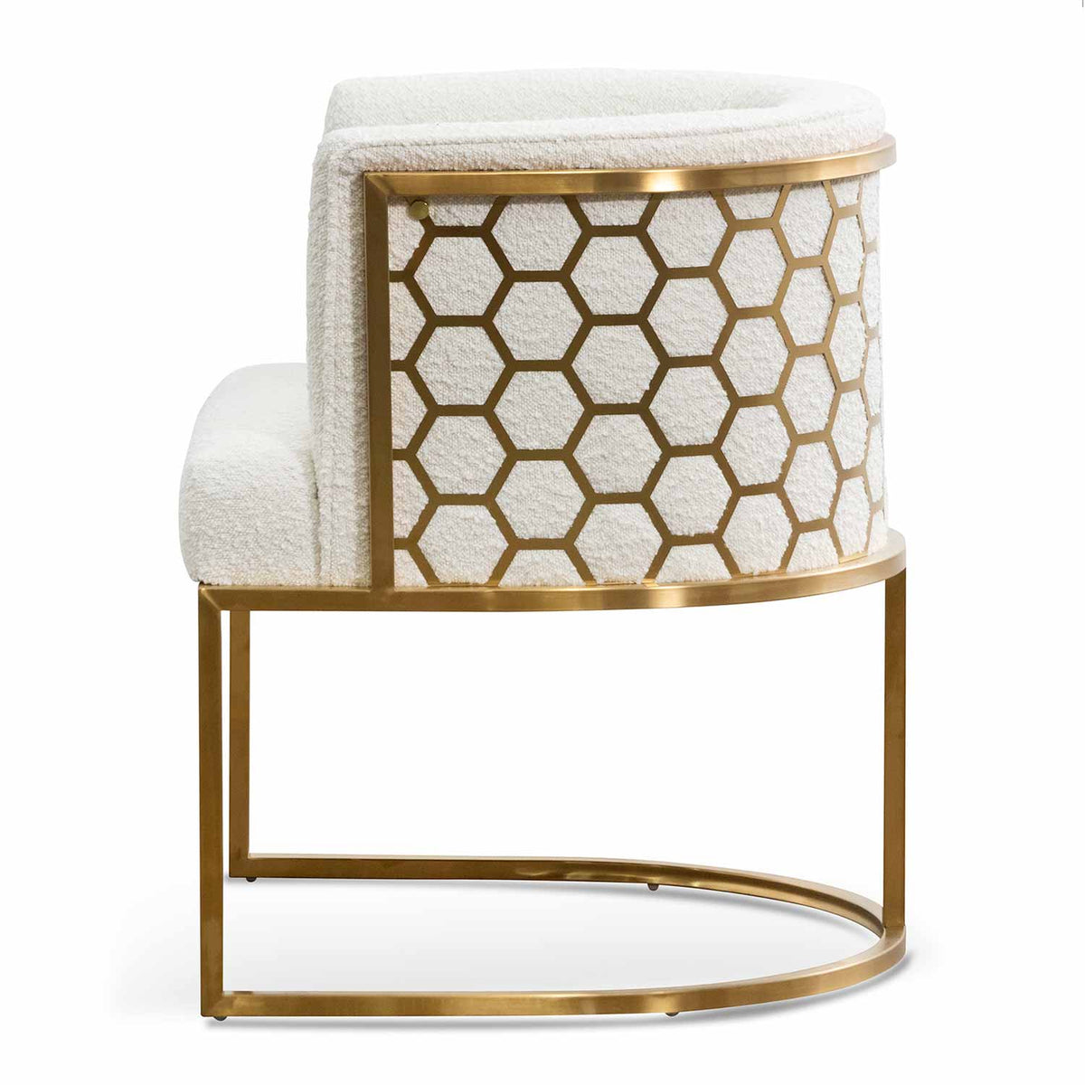 Side view of Kate white velvet lounge chair with black velvet seat, brushed gold armrests, and blue steel sofa core – sophisticated design blending luxury and modern elegance