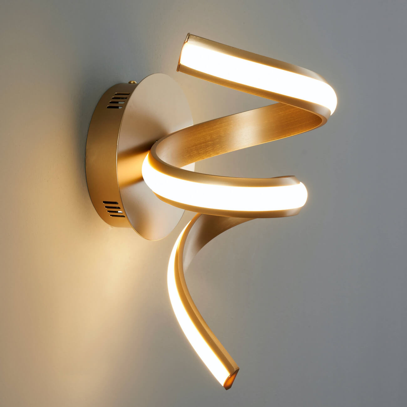 Lara golden spiral LED wall sconce light by Lux Decor Australia with elegant modern style