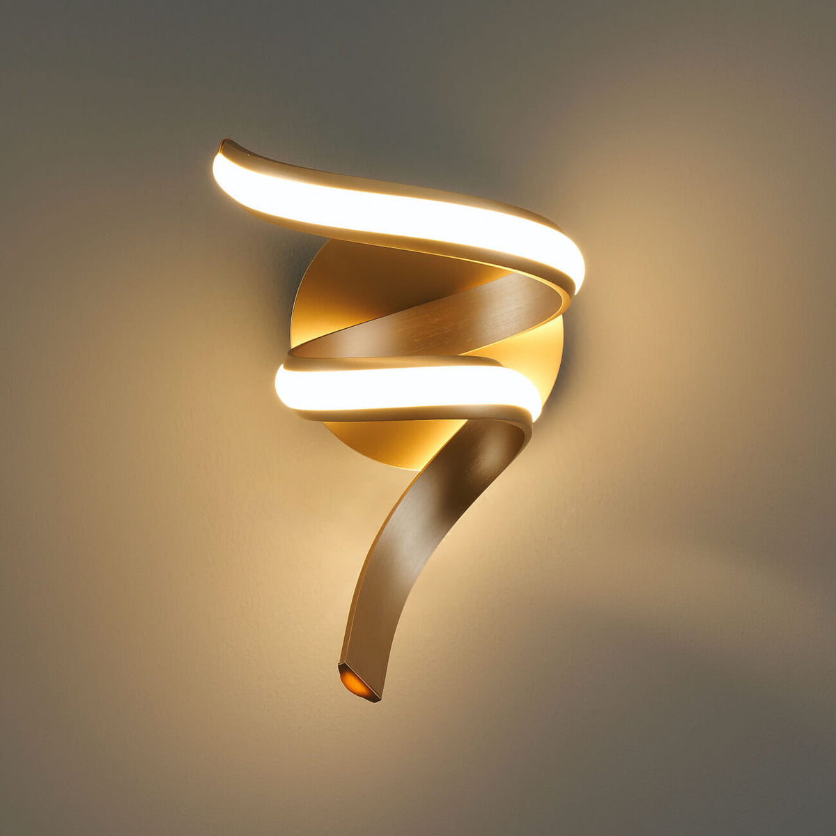 Front view of Lara golden spiral LED wall sconce light with elegant design in Australia