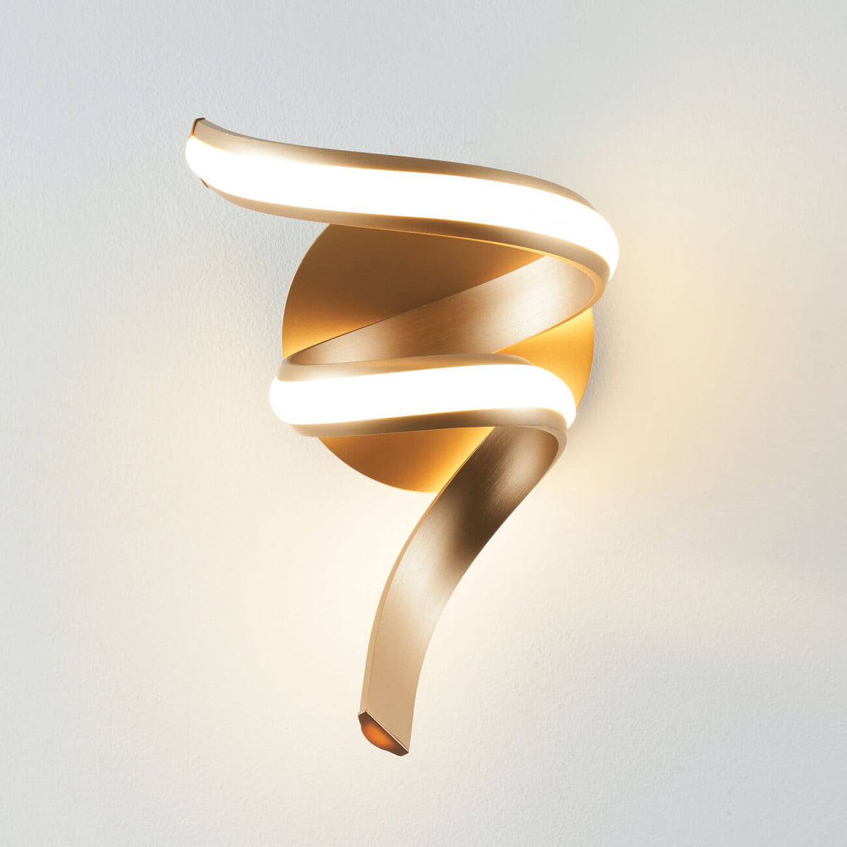 Front view of Lara golden spiral LED wall sconce light by Lux Decor Australia
