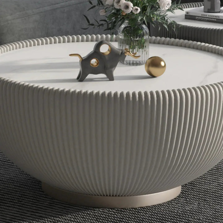 Close-up view of large drum coffee table highlighting detailed texture and craftsmanship