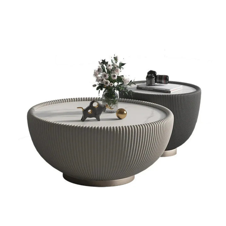 Front view of large drum coffee table showcasing modern round design and elegant finish