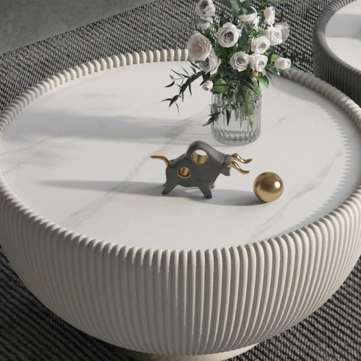 Top view of large drum coffee table highlighting smooth surface and contemporary design