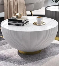Large drum-style wooden coffee table with round shape, perfect as a living room centerpiece