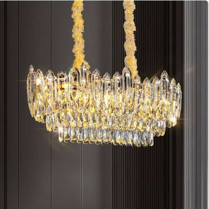 Lighthouse Gold Chandelier Light Turned On – Side View of Elegant Modern Ceiling Fixture