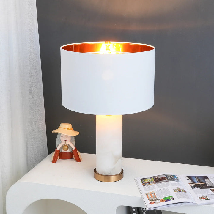 Modern Lineham table lamp with alabaster base, linen shade, and brass accents