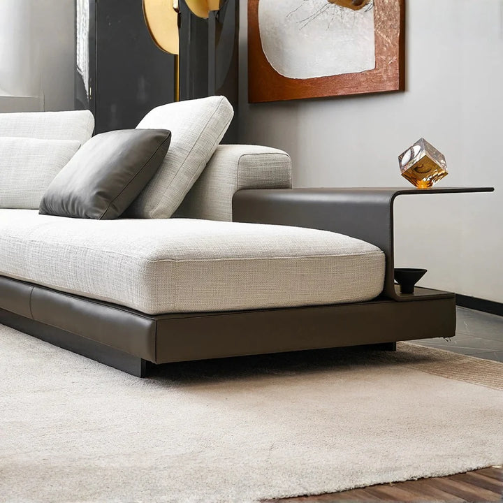 Detail view of living room sofa customised made-to-order highlighting fabric texture and craftsmanship