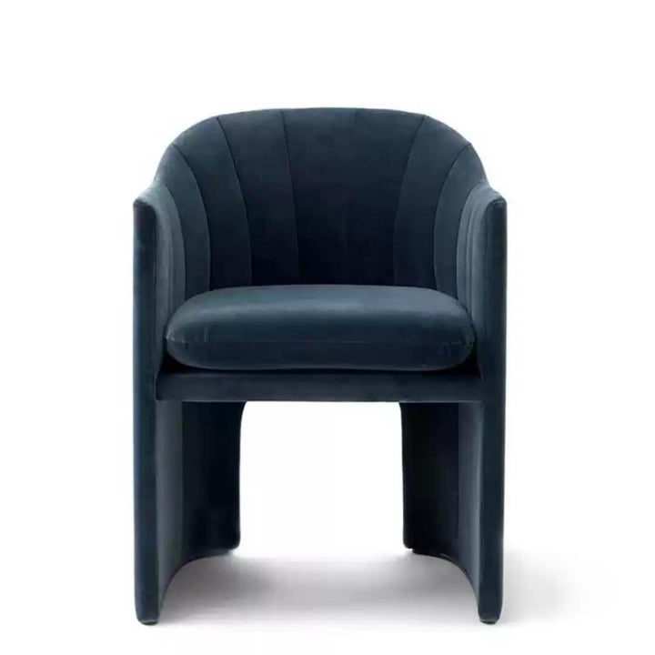 Front side of Loafer dining chair with custom upholstery, highlighting smooth fabric finish and modern frame