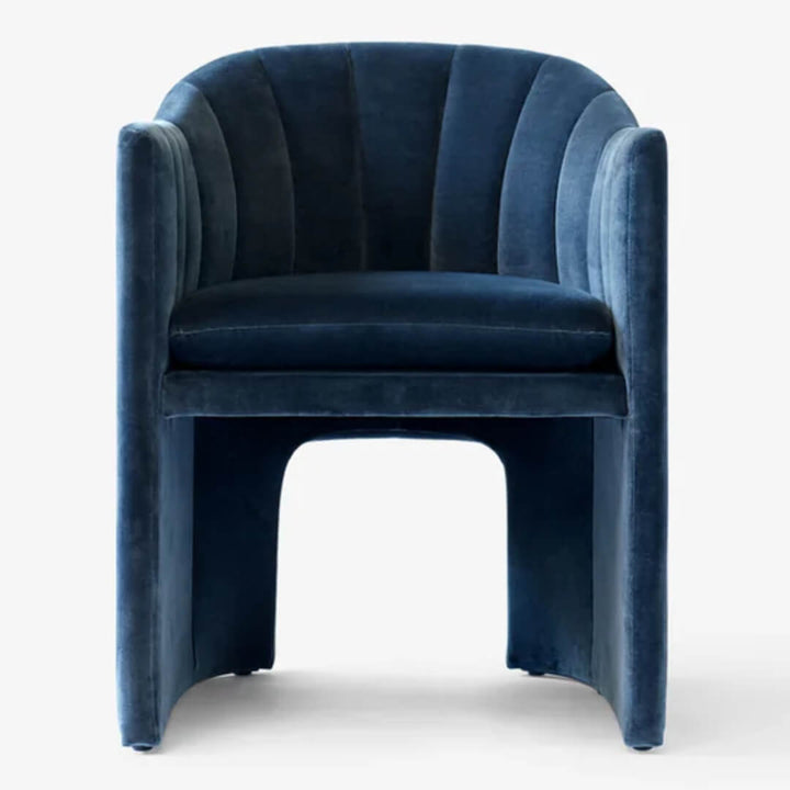 Close-up detail of Loafer dining chair upholstery, showcasing fabric texture, stitching, and craftsmanship