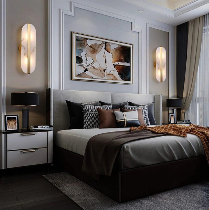 Long ellipse alabaster wall sconce lighting on bedroom wall for modern interiors