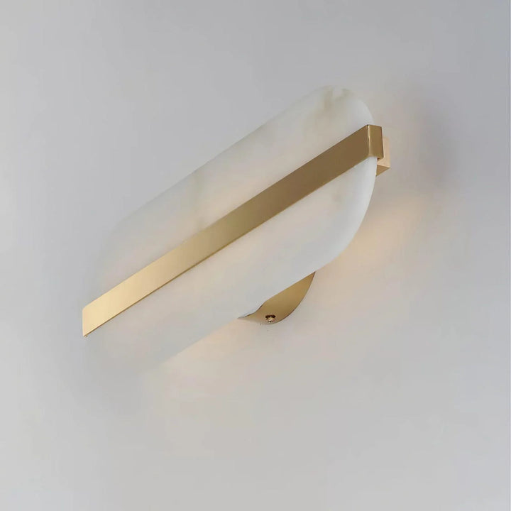 Side view of long ellipse alabaster wall sconce lighting for modern interiors