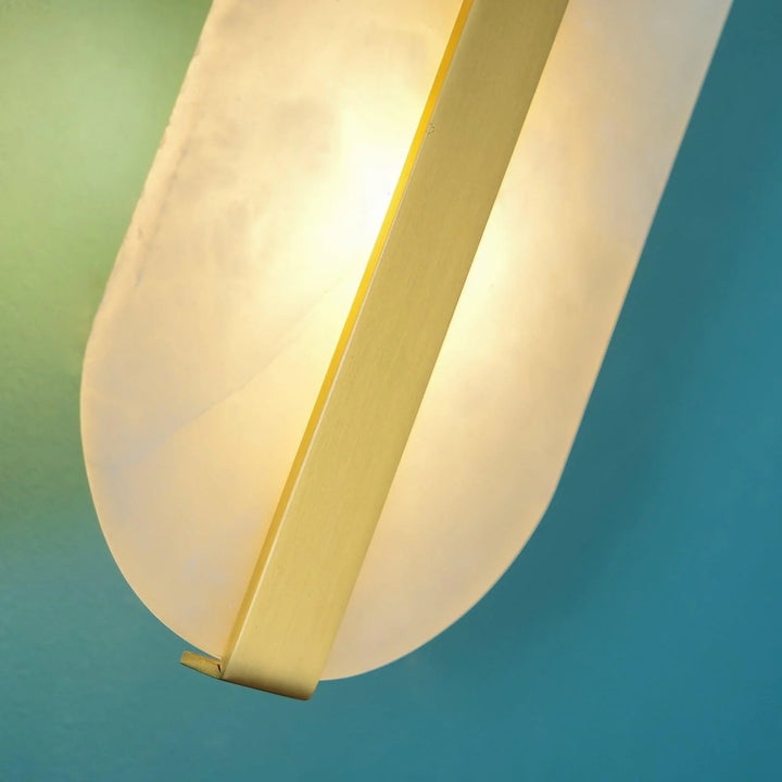Luxury wall mount detail view of long ellipse alabaster wall sconce lighting