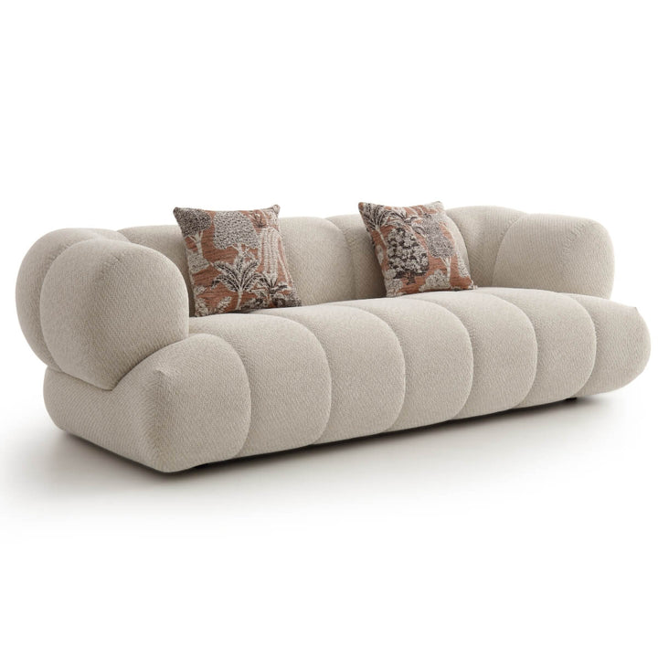Front view of Luma Cloud sofa featuring plush cushions and contemporary design in neutral tones