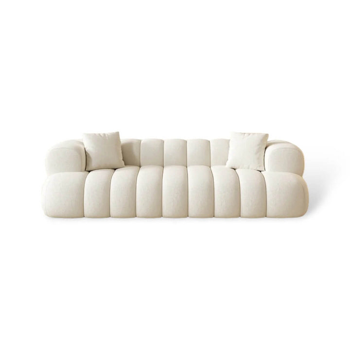 Front view of Luma Cloud sofa showcasing plush cushions and modern design in neutral tones