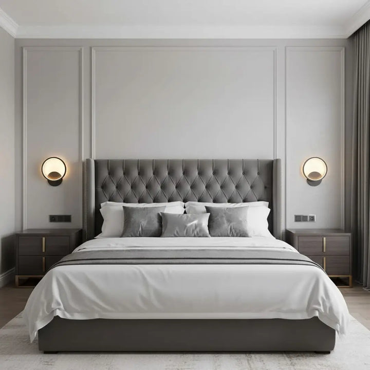 Lumen Ring wall light front view in a cozy bedroom setting, adding modern warm ambient lighting.