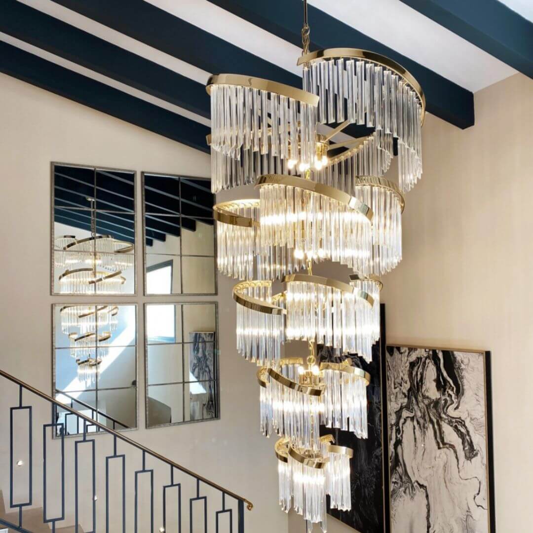 Luminary Glass Chandelier Light hanging beside staircase, illuminating the space with elegant glow and modern glass design.