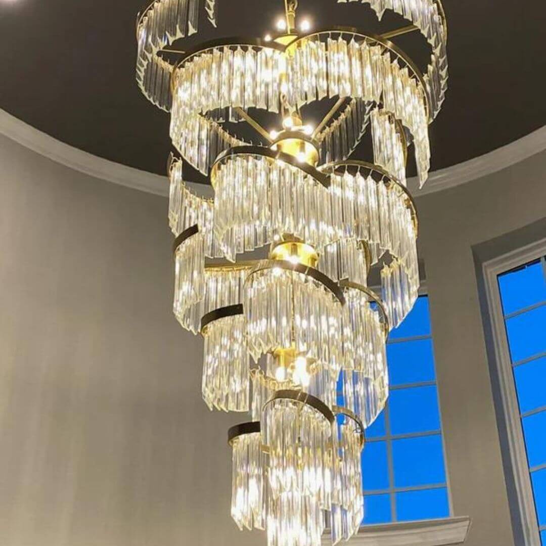 Bottom view of Luminary Glass Chandelier Light showcasing its symmetrical glass shade arrangement and soft, diffused illumination for a modern and elegant interior aesthetic.